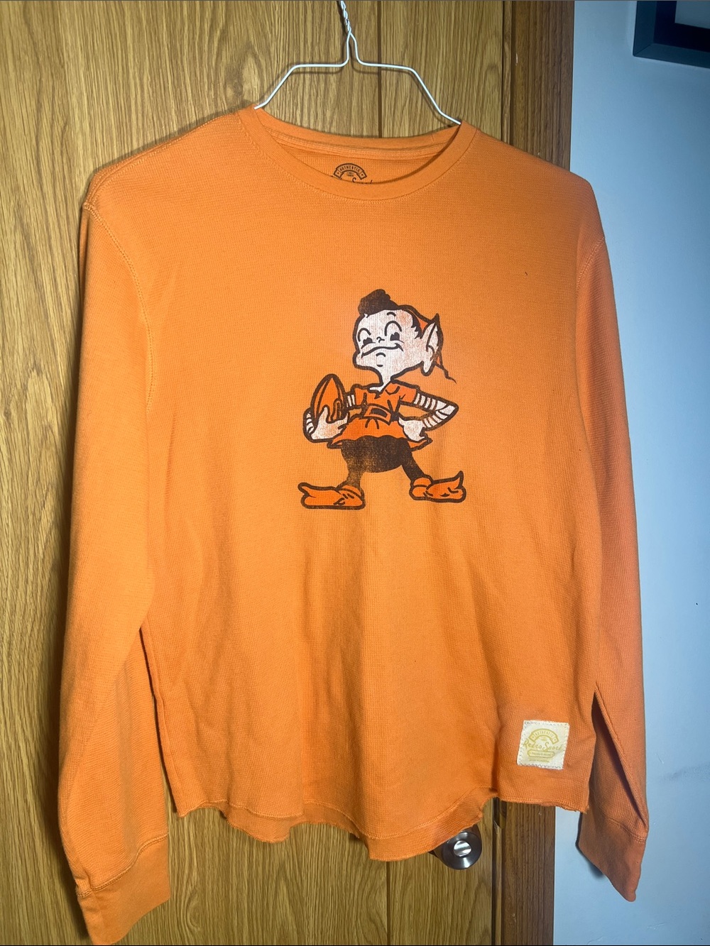 Reebok Orange Long Sleeve Graphic Shirt with Mascot Print